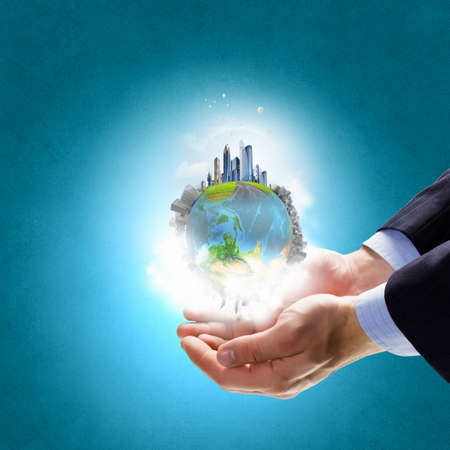 Hands holding Earth planet concept.  