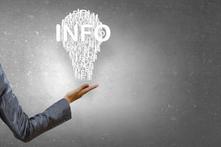 Businesswoman holding in hand successful idea conceptの写真素材