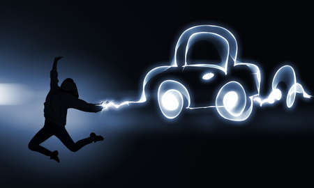 Young girl jumping high in sky representing youth conceptの写真素材