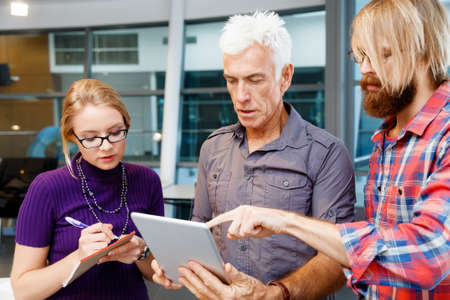 Business team working together in officeの写真素材