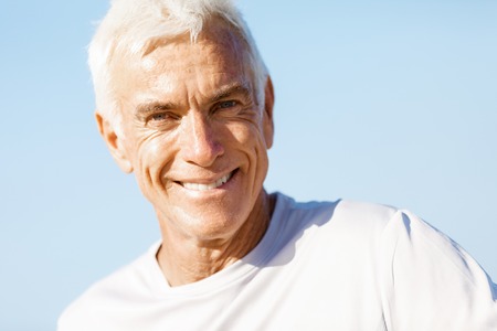 Portrait of healthy senior man smiling at cameraの写真素材