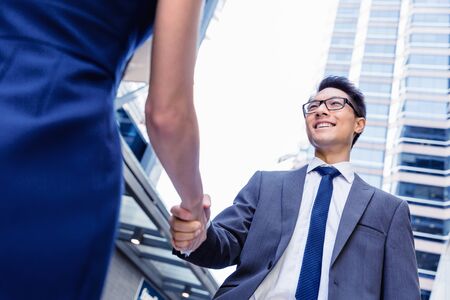 Businessman meeting his colleague outdoorsの写真素材