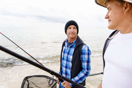Picture of fishermen fishing with rods