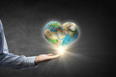 Businessman hands holding Earth planet. の写真素材