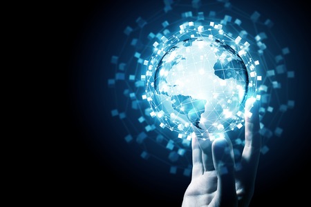 Global connection concept with digital planet in handsの写真素材
