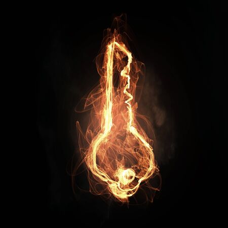 Glowing light key sign on dark backgroundの写真素材
