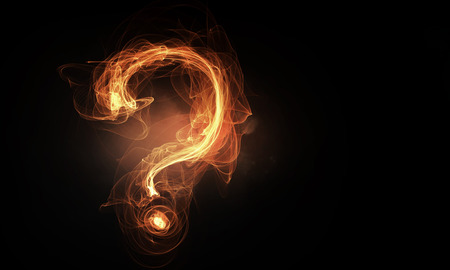 Glowing question mark symbol on dark backgroundの写真素材