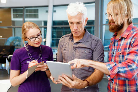 Business team working together in officeの写真素材