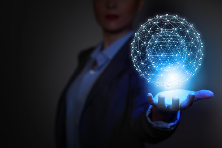 Global connection concept with digital planet in handsの写真素材