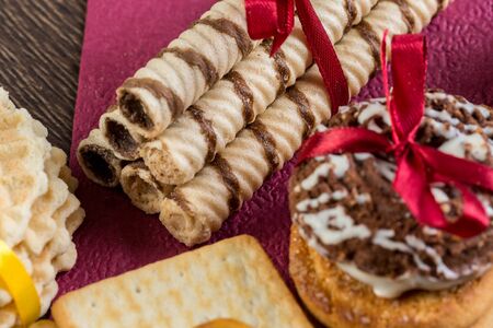 Assorted biscuits and sweets on table