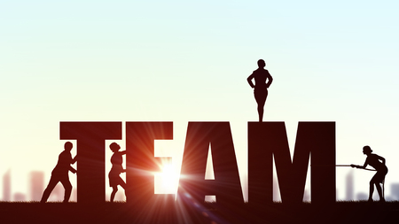 Business people pulling word team representing collaboration conceptの写真素材