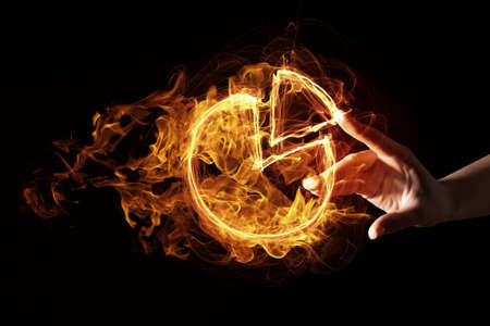 Finger touch ire glowing graph pie sign on dark background
