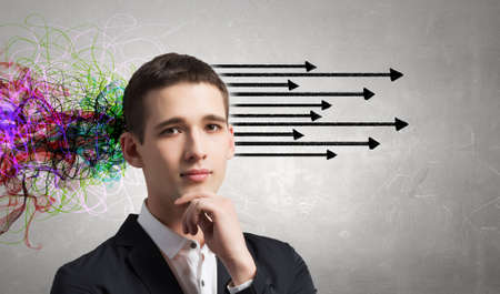 Thoughtful businessman with arrows and thoughts coming out of his head