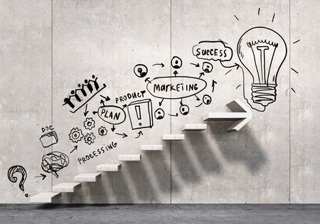 Business strategy plan over ladder leading to successの写真素材