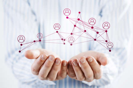 Close view of businessman holding tablet presenting social network concept