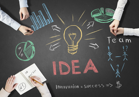 Top view of people hands drawing business strategy successful planの写真素材