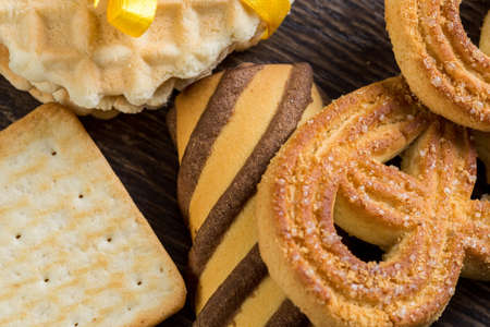 Assorted biscuits and sweets on table