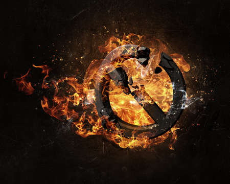 Prohibition broken symbol in fire flames on dark backgroundの写真素材