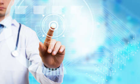Close view of male doctor touching icon of media screen