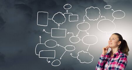 Thinking woman making decision and ideas coming out of her headの写真素材