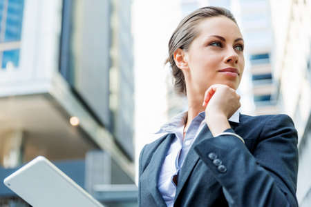 Portrait of young business woman outdoorsの写真素材