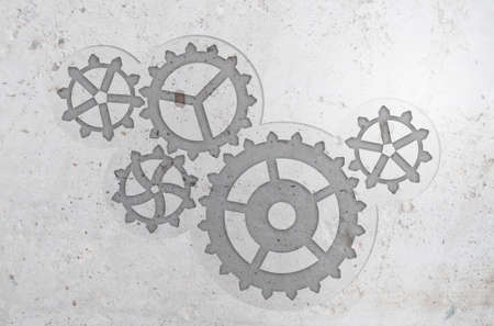Concept of harmonious working mechanism with gears and cogwheelsの写真素材