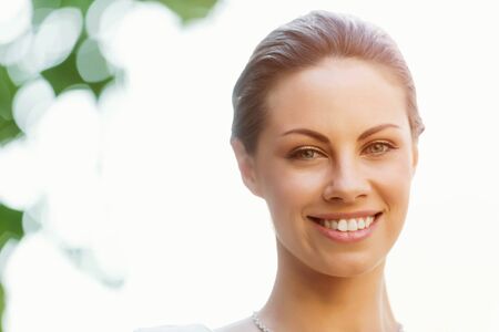Portrait of young business woman outdoors
