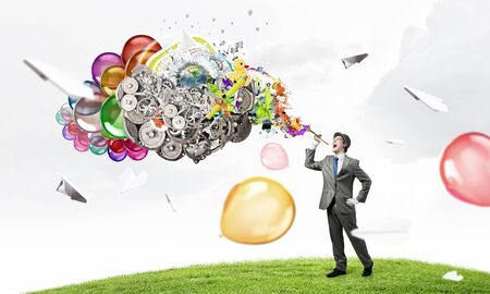 Funny man in suit and white gloves playing fifeの写真素材