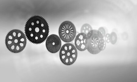 Concept of harmonious working mechanism with gears and cogwheelsの写真素材