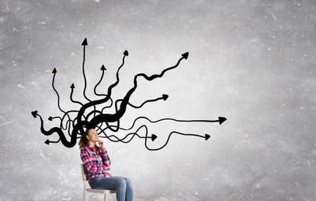 Thinking woman making decision and ideas coming out of her head