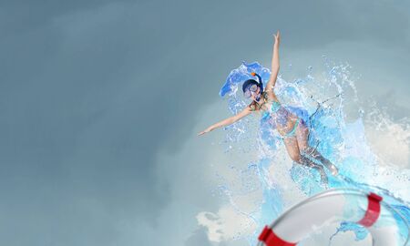 Kid girl of school age in diving mask having fun
