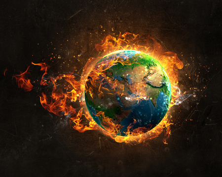Burning Earth Planet on dark background.の写真素材