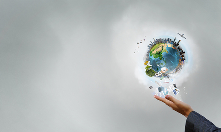 Businesswoman hand holding Earth planet. Elements of this image are furnished by NASAの写真素材