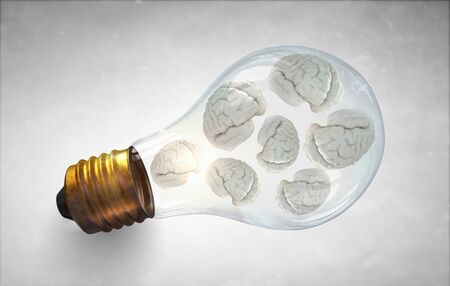 Idea concept with brain inside of light bulb