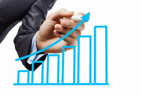 Hand of businessman drawing graph on white backgroundの写真素材