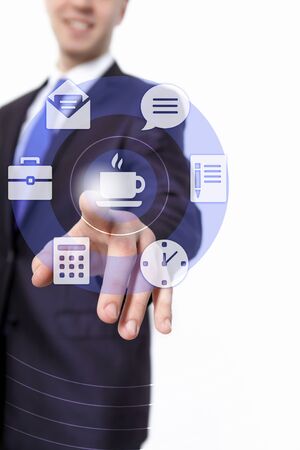Hand of businessman pressing icon on media interfaceの写真素材