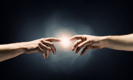 Close up of human hands touching with fingersの写真素材