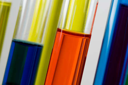 Glass tubes with color liquids in science laboratoryの写真素材
