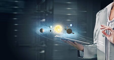 Close view of elegant businesswoman using tablet deviceの写真素材