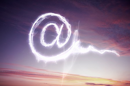 Background image with email concept in evening sky