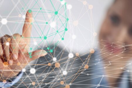 Businesswoman hand touching with finger digital connection lines on virtual screenの写真素材