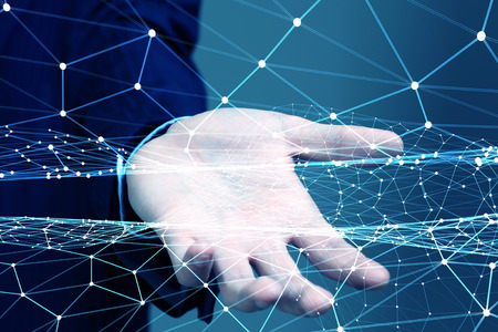 Businessman presenting in plams digital connection linesの写真素材