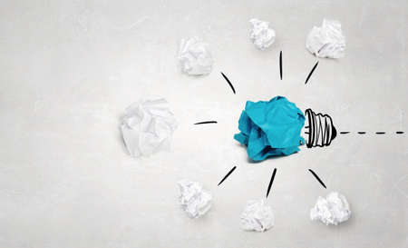 Concept for creativity and inspiration with paper ball as bulbの写真素材