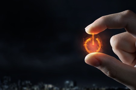 Close view of male hand taking with fingers power sign