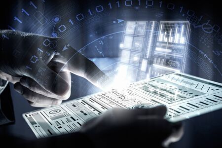 Close view of businessman touching screen of tablet or virtual panel