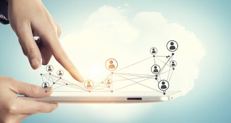 Tablet pc in hand and cloud connection media concept