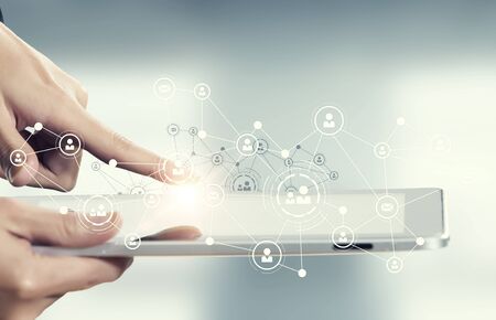 Hand holding smartphone and connection lines as social network concept