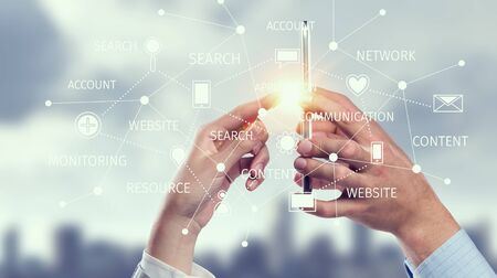Smartphone in hand and cloud computing user interface