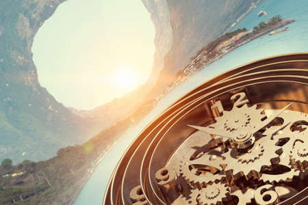 Time concept with old clock mechanism against sky backgroundの写真素材