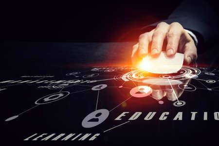 Hand of businessman on dark 3D rendering background using wireless mouse